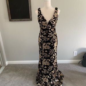 Black and gold sequin evening dress